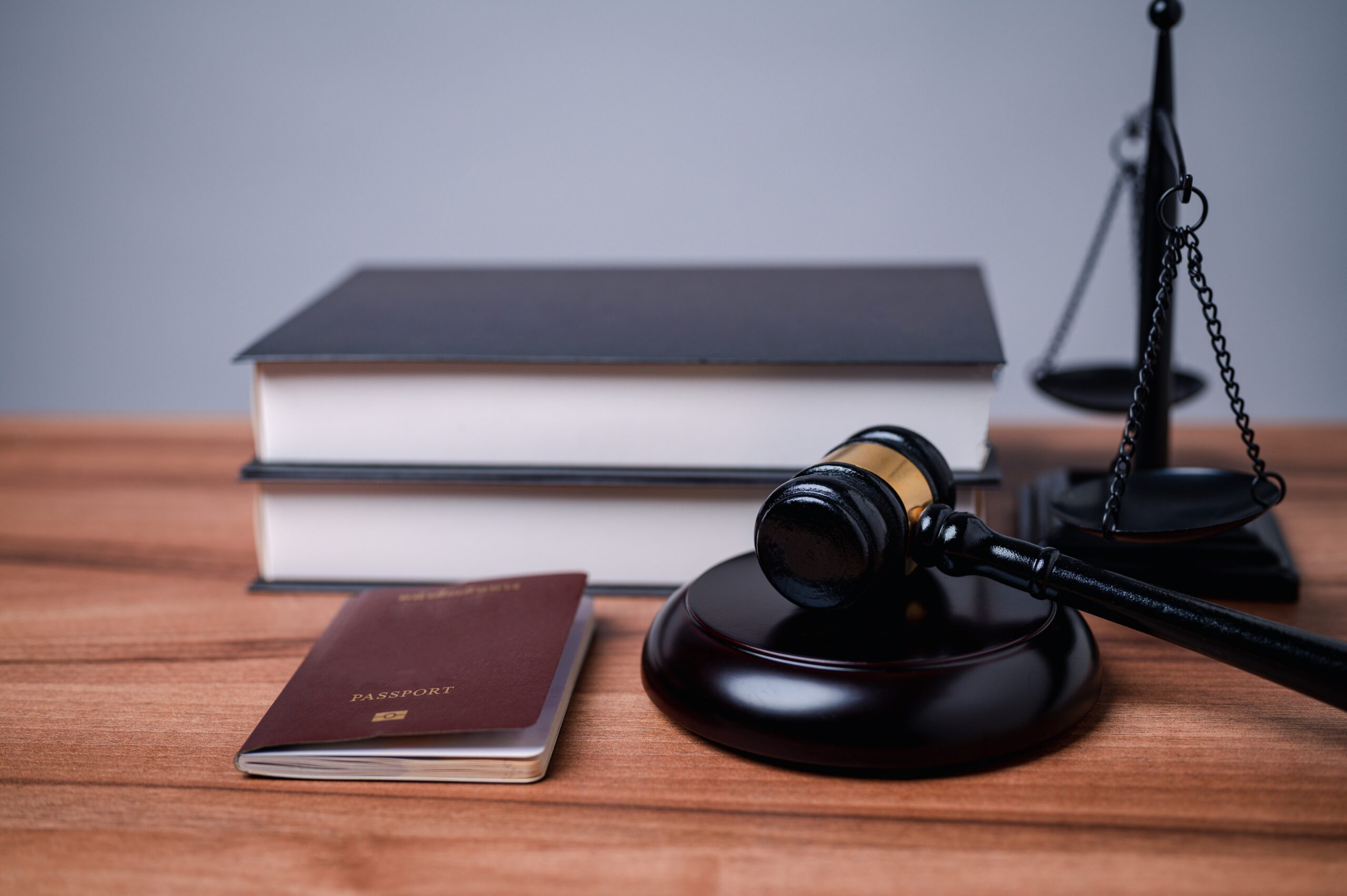 A legal book and a gavel in a lawyers office who specializes in I-601A Waiver.