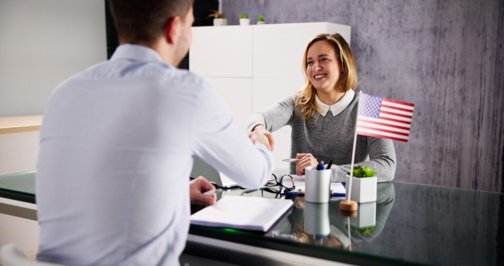 Immigration Lawyer with client discussing Texas SB 4