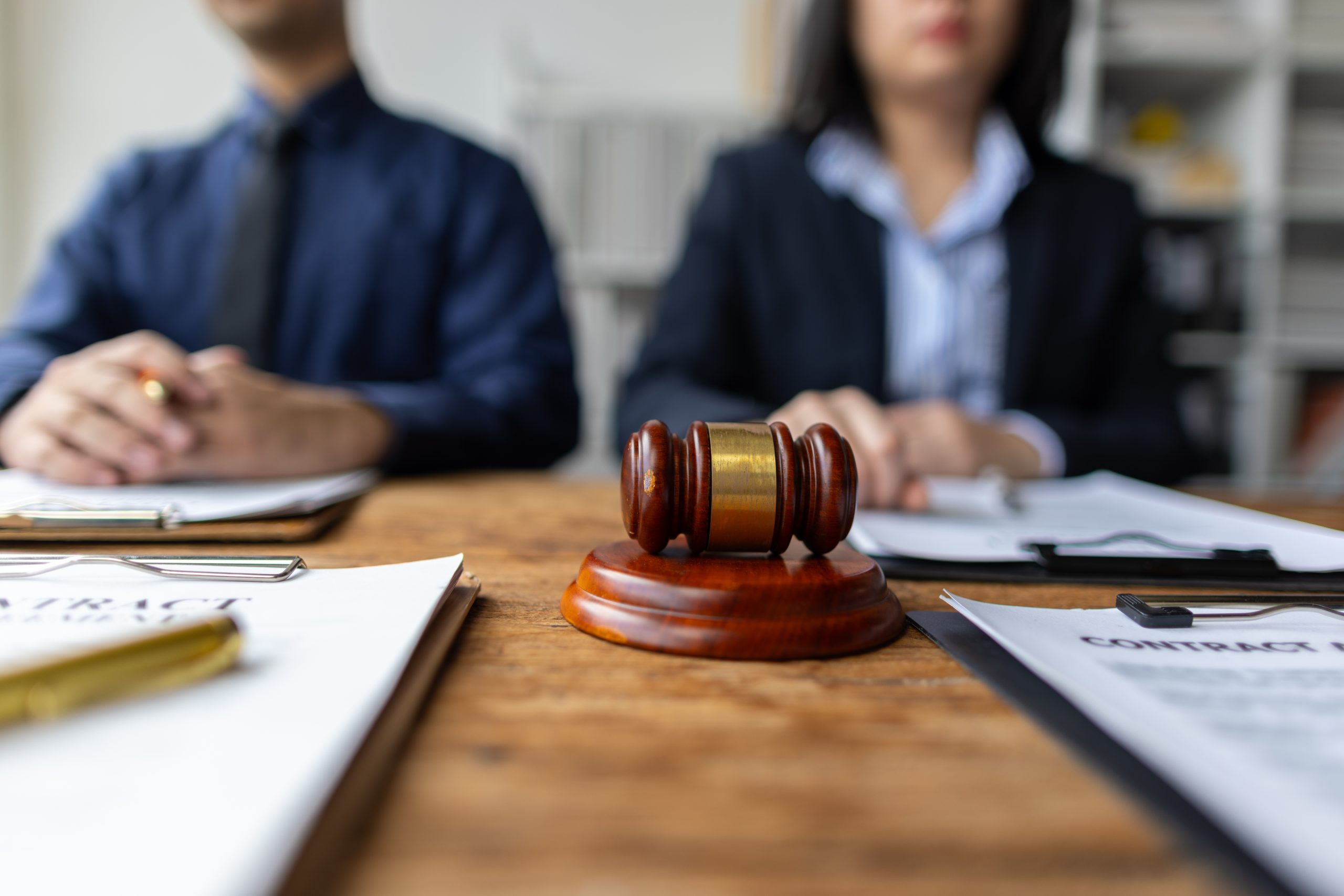 Clients consulting with immigration lawyer regarding USCIS May Deny Cases Without an RFE
